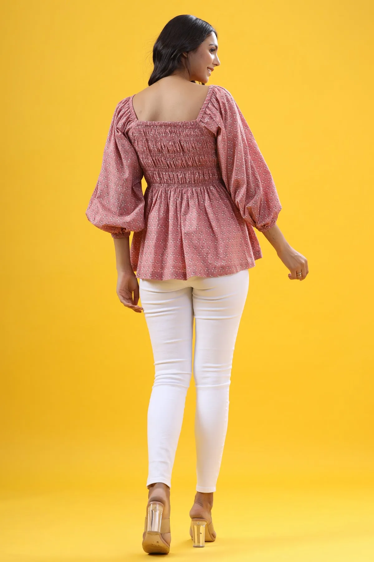 Floral Motifs on Pink Smocked Top